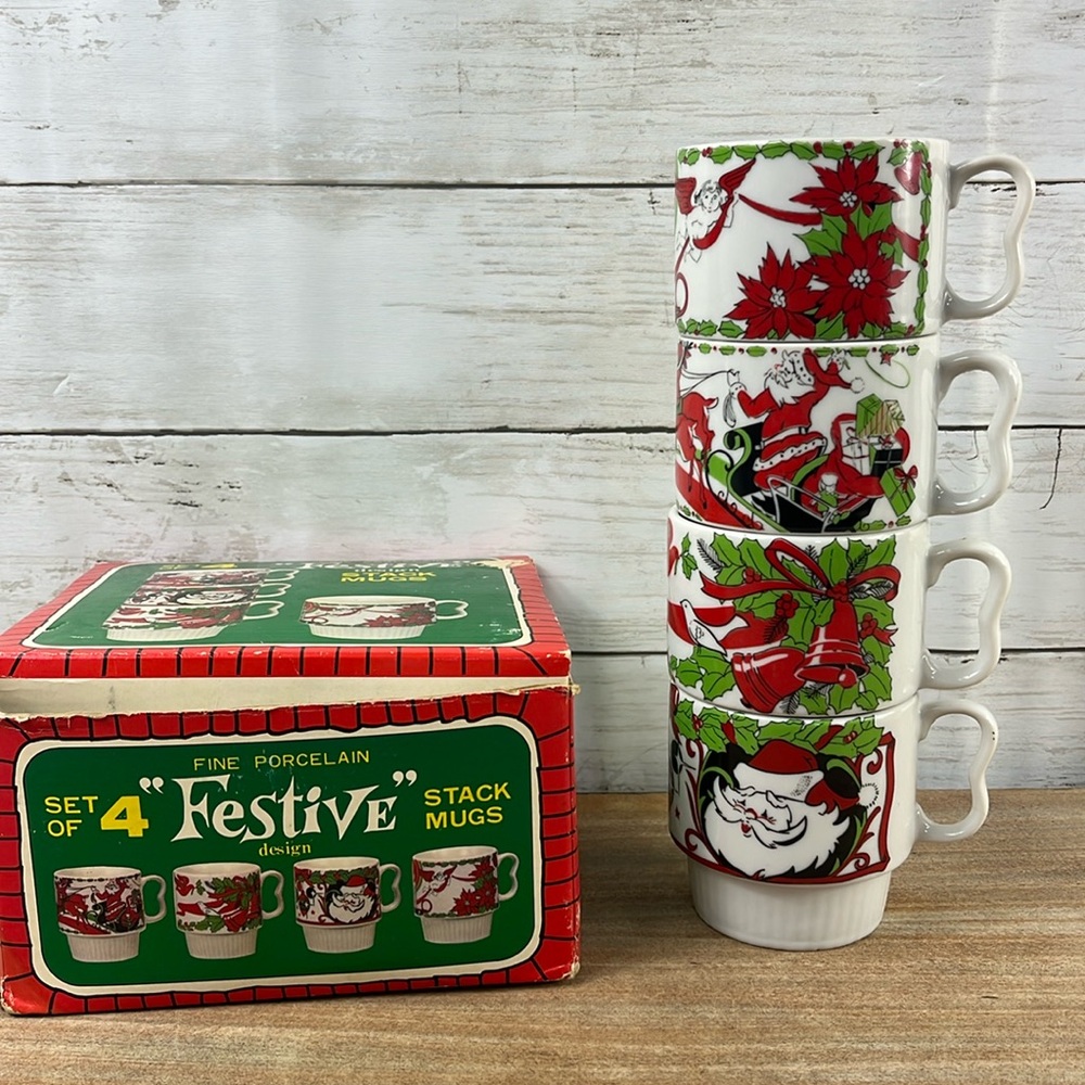 Vintage set of 4 fine porcelain stackable holiday Christmas Santa mugs